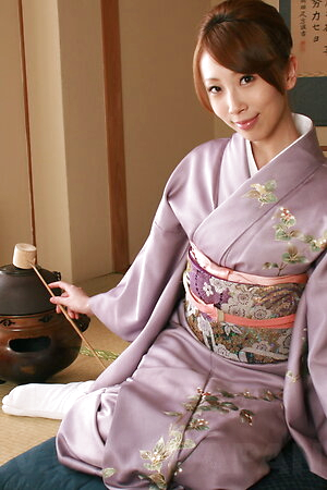 Yui Saejima shows hairy pussy and round tits under kimono on the floor